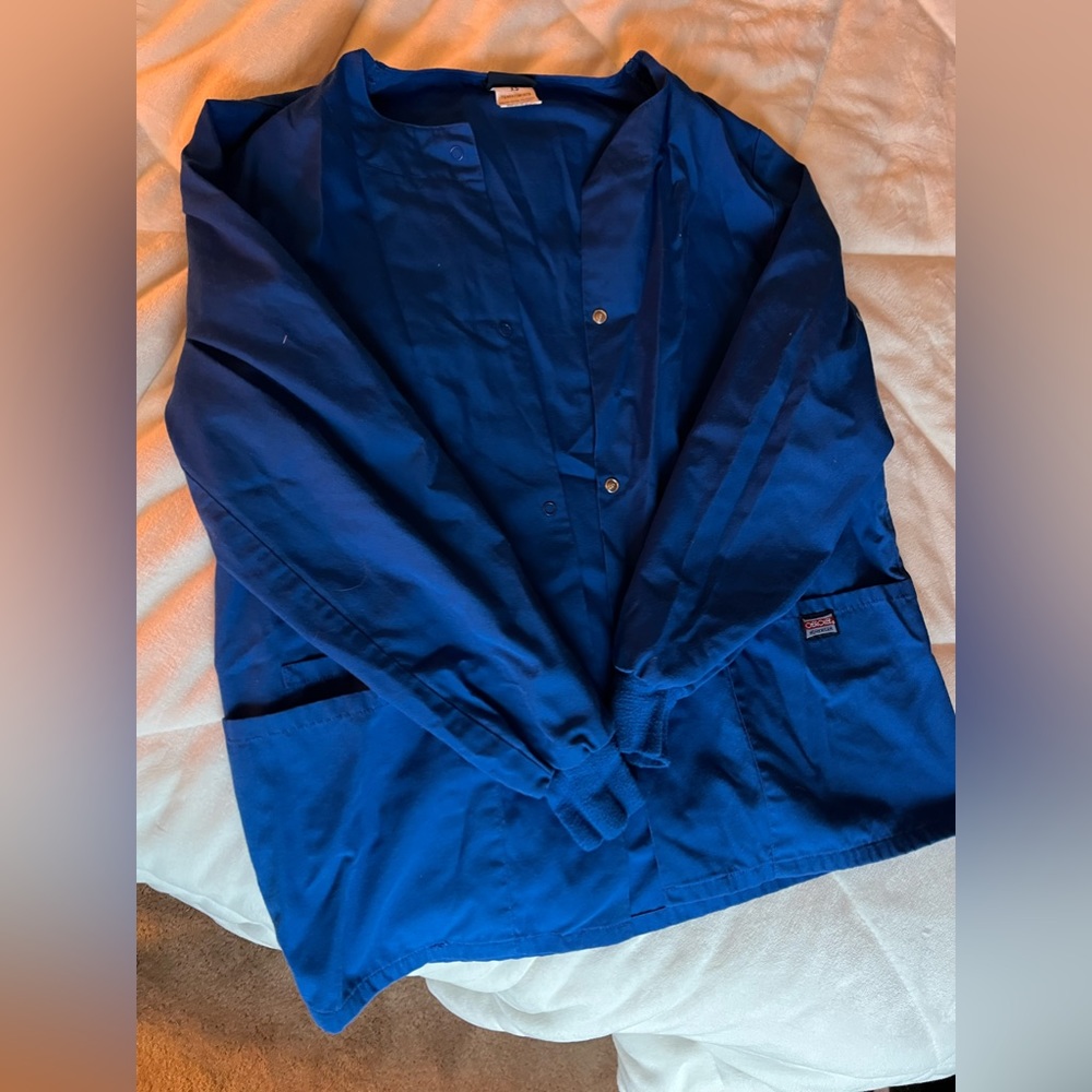 Royal blue scrub jacket.